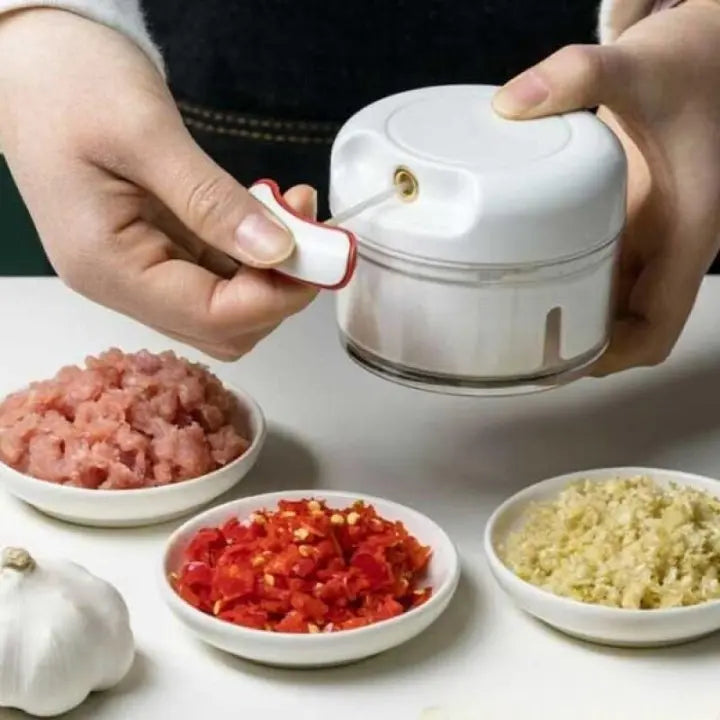 Multifunctional Manual Food Chopper – Mini Handheld Vegetable Grinder & Meat Cutter | Random Color – Ideal for Pakistani Kitchens Gadget Xpres