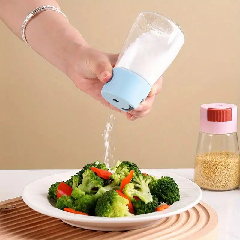 Sealed Glass Spice Jar – Salt & Pepper Dispenser Bottle (180ml) | Press Control, Durable & Leak-Proof | Random Color – Ideal for Pakistani Kitchens Gadget Xpres