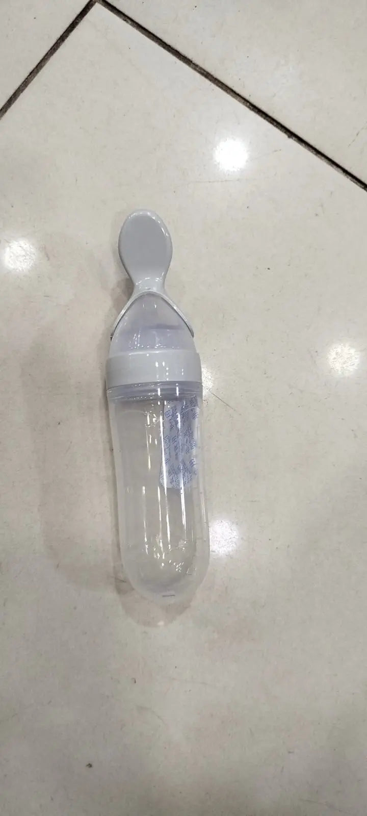 Silicone Baby Spoon Feeder with Bottle | Reusable Food Feeder | Teething Mitten for Infants | BPA Free | Random Color Gadget Xpres